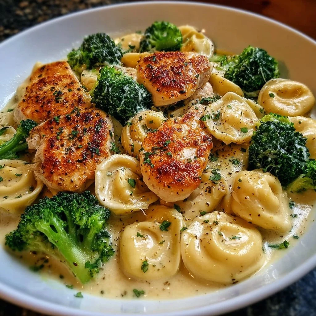 Creamy Garlic Parmesan Tortellini with Chicken and Broccoli in a serving bowl